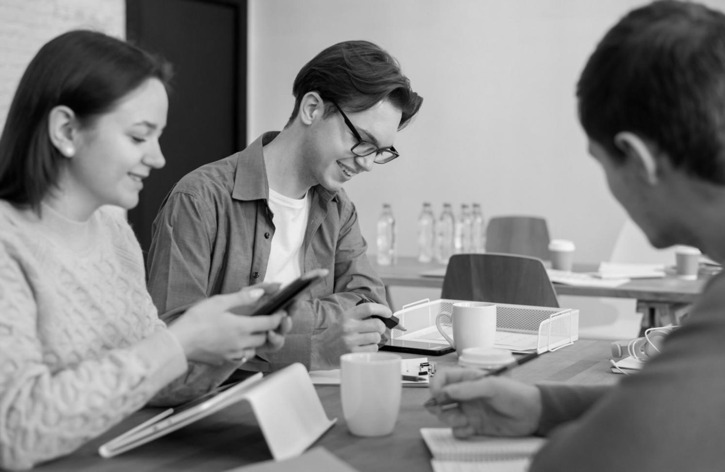 Banking security professional analyzing threat patterns on multiple screens